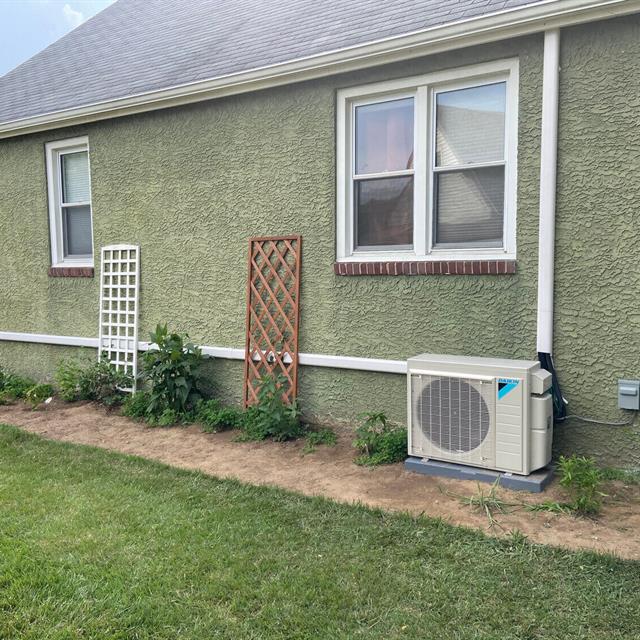 Air purification unit installed outside a home