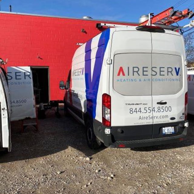 Aire Serv Van outside building