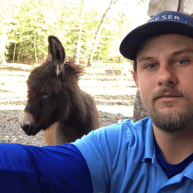 Aire Serv pro and a donkey