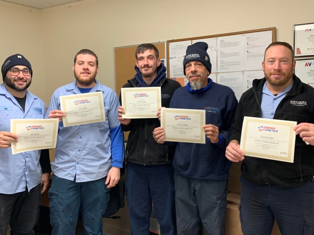 Team members  after their System 2000 boiler training