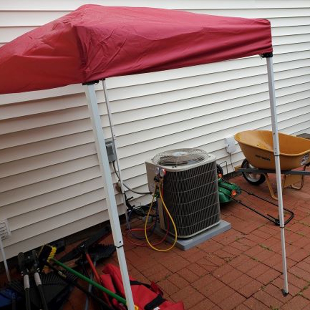 Pop-up Tent Over AC Unit Outside