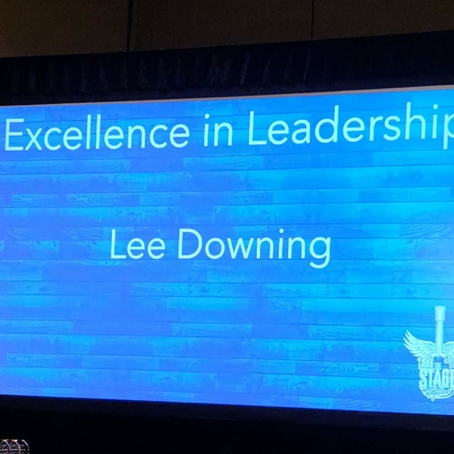 Sign that reads excellence in leadership, lee downing