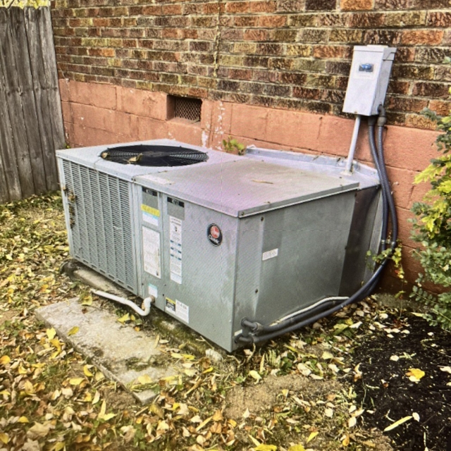 ac unit on side of house