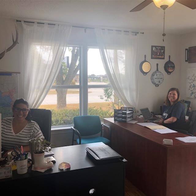 two women working at desks