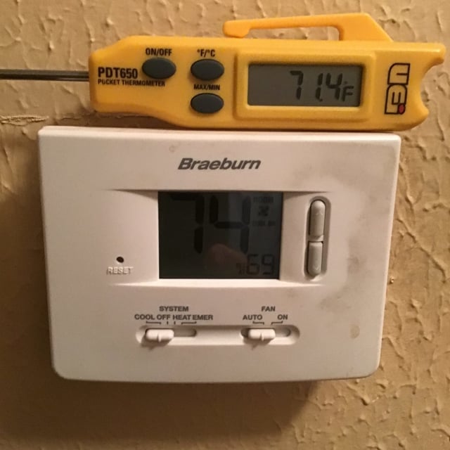 yellow tool on thermostat