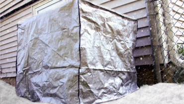 Air conditioner covered during winter