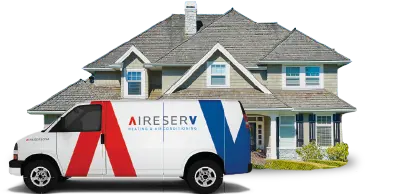 Aire Serv branded van in front of two story residential home with gray roof.